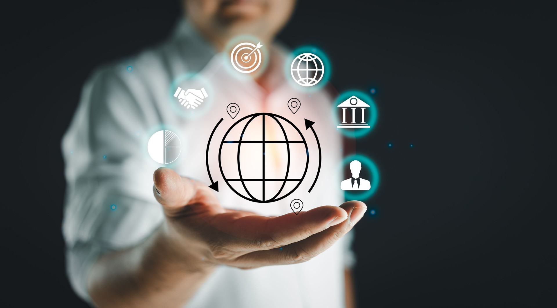 Business technology solution concept. Businessman holding icons of business information technology.