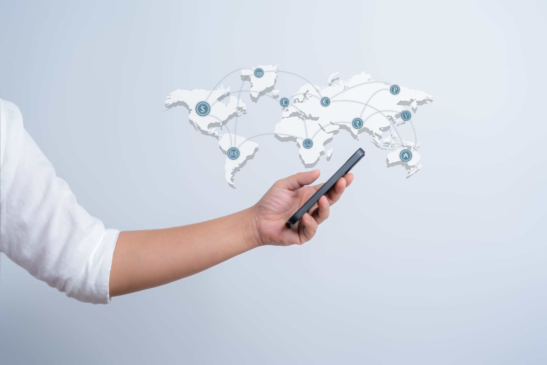 Businessman use mobile phone for money transfer and exchange, global currency, currency exchange, global financial market work via mobile device. Stock market, Future trading, and Online transactions.